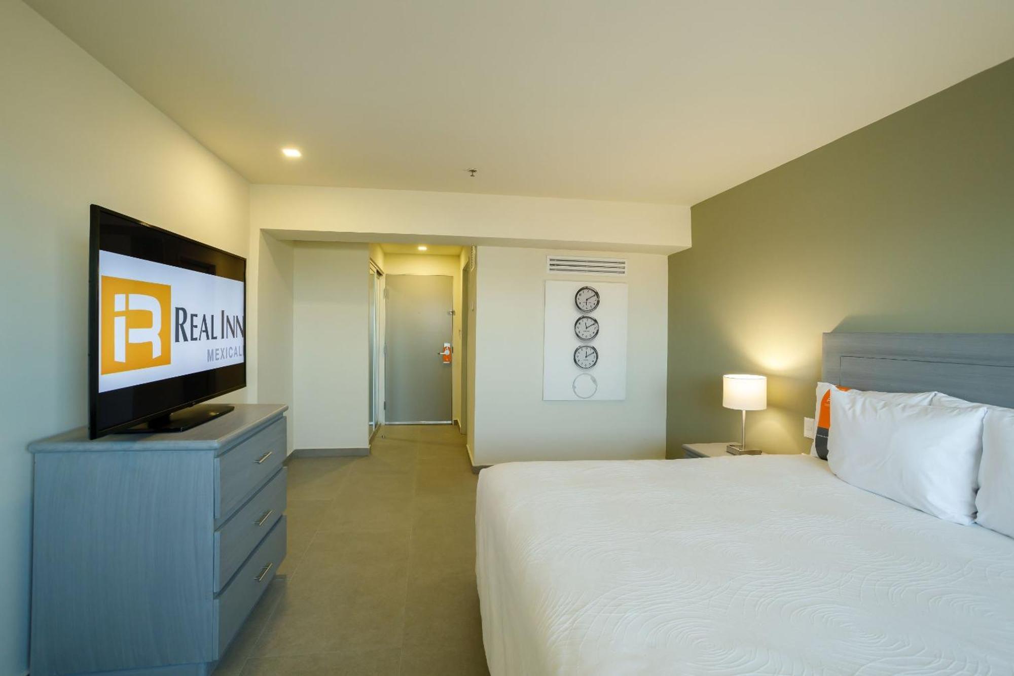 Real Inn Mexicali Exterior photo A bedroom at Realm